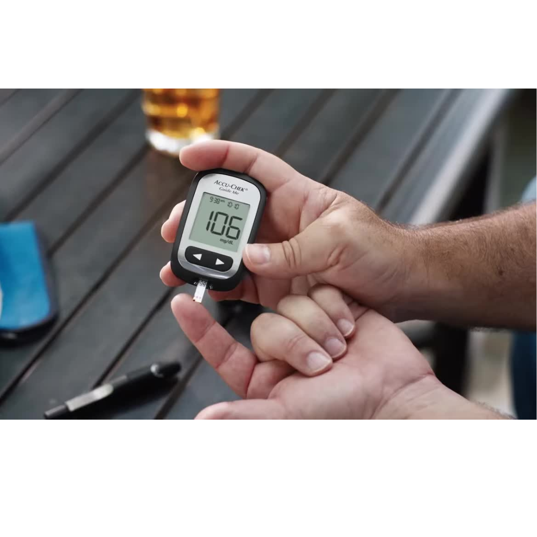 Accu-Chek Guide Me Blood Glucose Monitor with large display and Bluetooth connectivity for easy diabetes management.