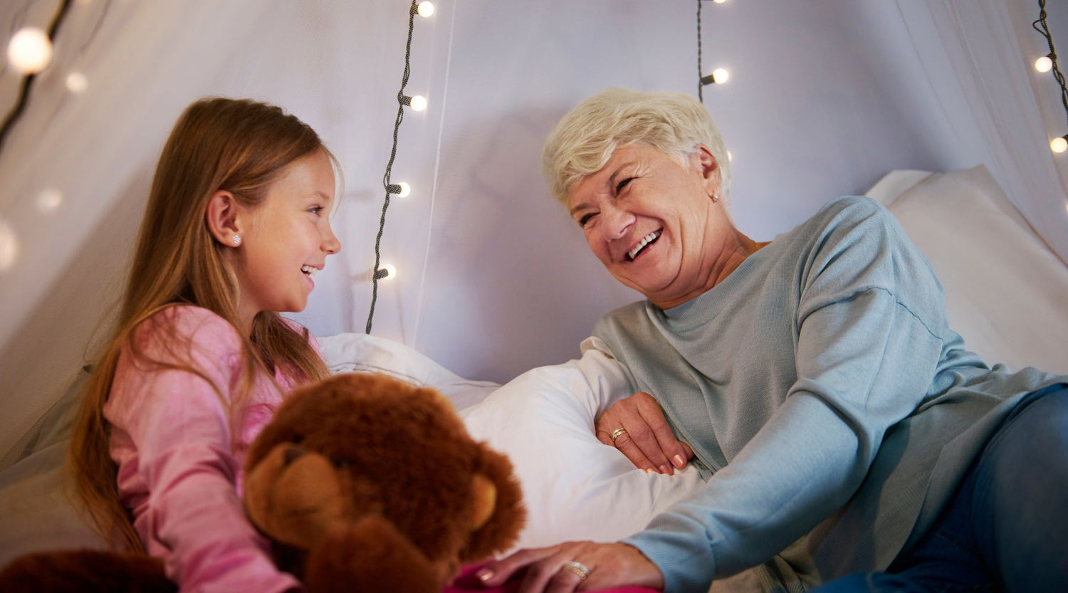 grandma and young girl talking about Night-Time Incontinence