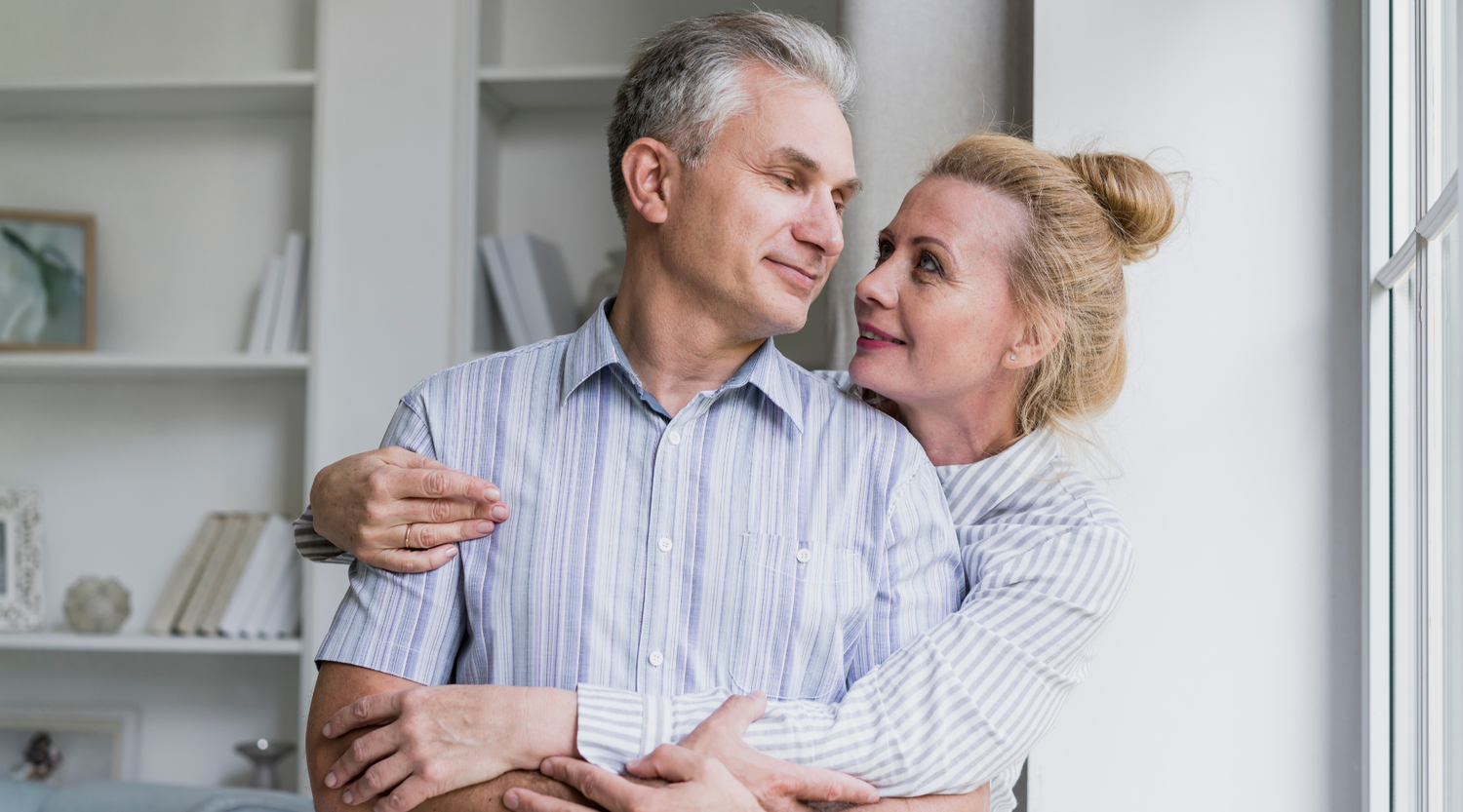 senior-couple-hugging-each-other thinking about the right incontinence products