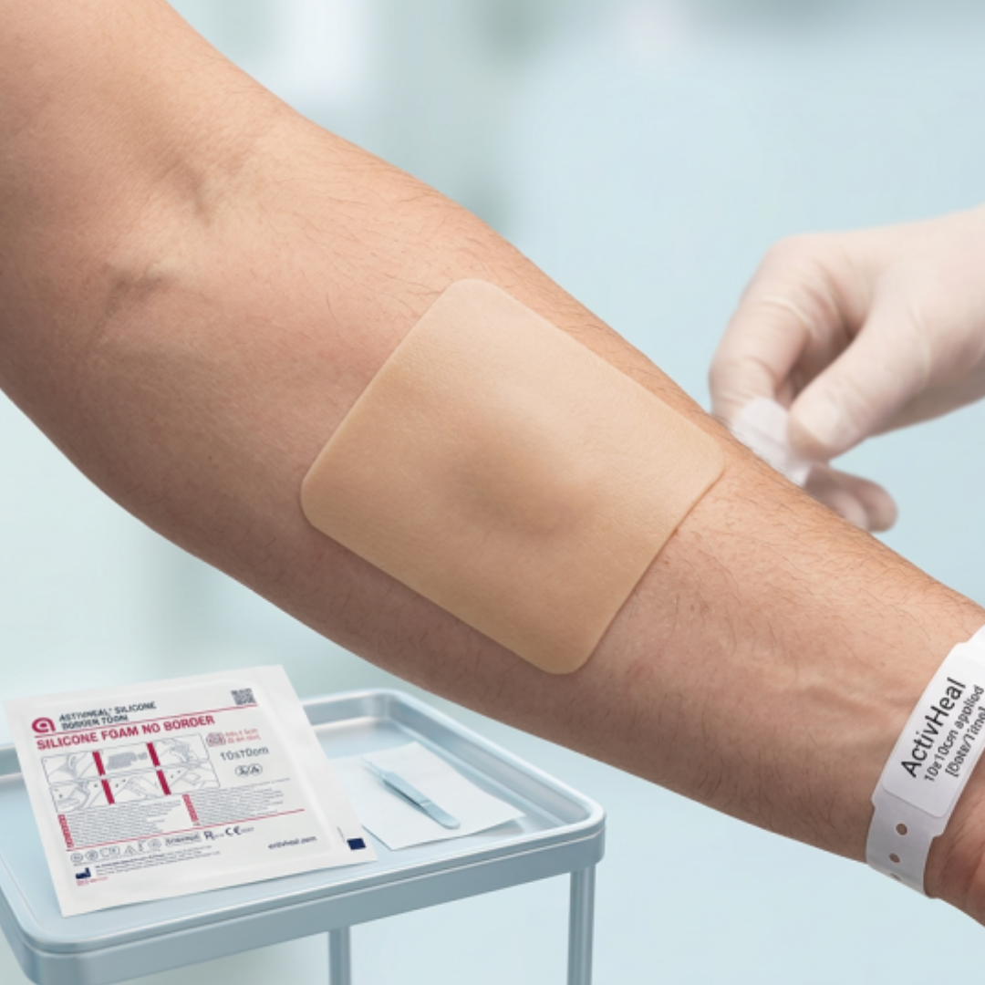 ActivHeal Silicone Foam No Border 10 x 10cm dressing shown flat, soft silicone layer for gentle adhesion, ideal for protecting moderate exuding wounds.