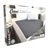 Packaging of Conni Bed Pad with Tuck-ins in charcoal color displayed in a home setting, indicating the product is for incontinence use.