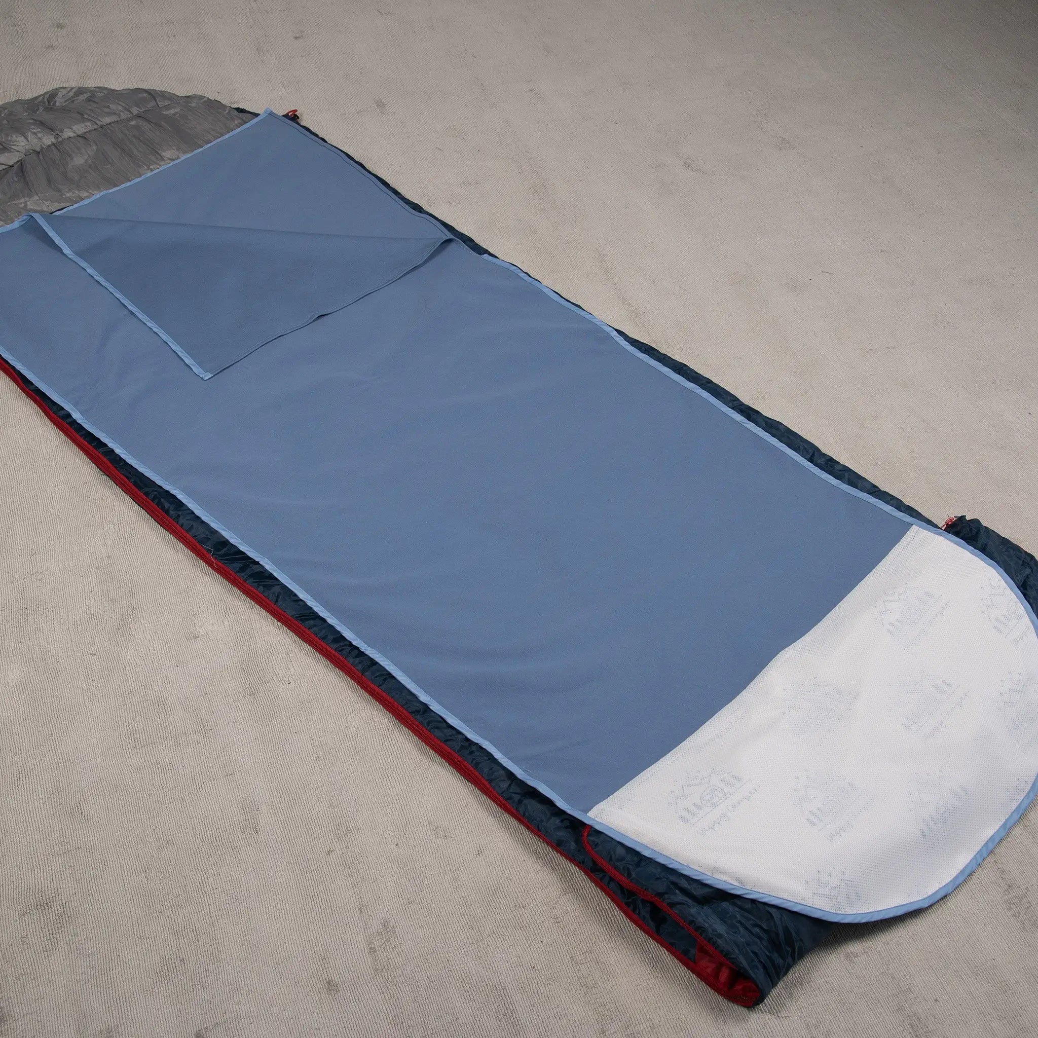 StayDry waterproof and absorbent sleeping bag liner in blue, designed for ultimate comfort and protection. This lightweight and breathable insert fits inside a sleeping bag, offering a soft, moisture-wicking surface with a waterproof backing to keep bedding dry and clean. Ideal for camping, travel, or incontinence support.