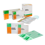 A collection of various sizes of Smith & Nephew Opsite Flexigrid dressings, showcasing boxes and individual transparent units.