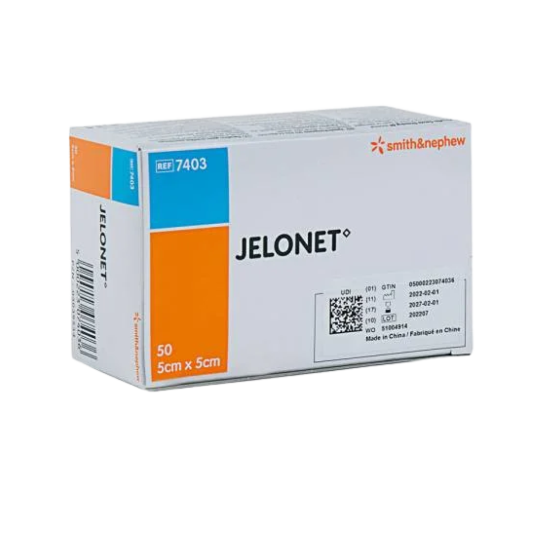 Box of Smith & Nephew Jelonet Paraffin Gauze Dressing, size $50 \times 5 \text{ cm} \times 5 \text{ cm}$, showing the REF 7403 number and manufacturing information.