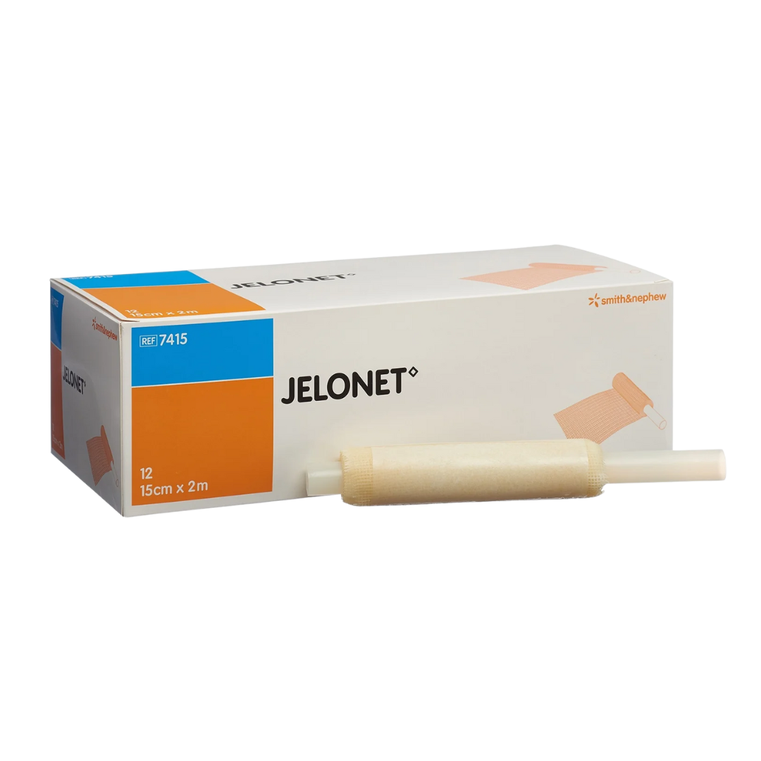 Side view of the Jelonet Paraffin Gauze Dressing box, size $15 \text{ cm} \times 2 \text{ m}$, with the petroleum jelly gauze roll product displayed next to it.
